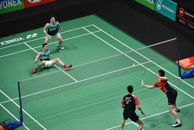 石油杯-男单全军覆没男双齐齐过关 “难兄难弟”冰火两重天